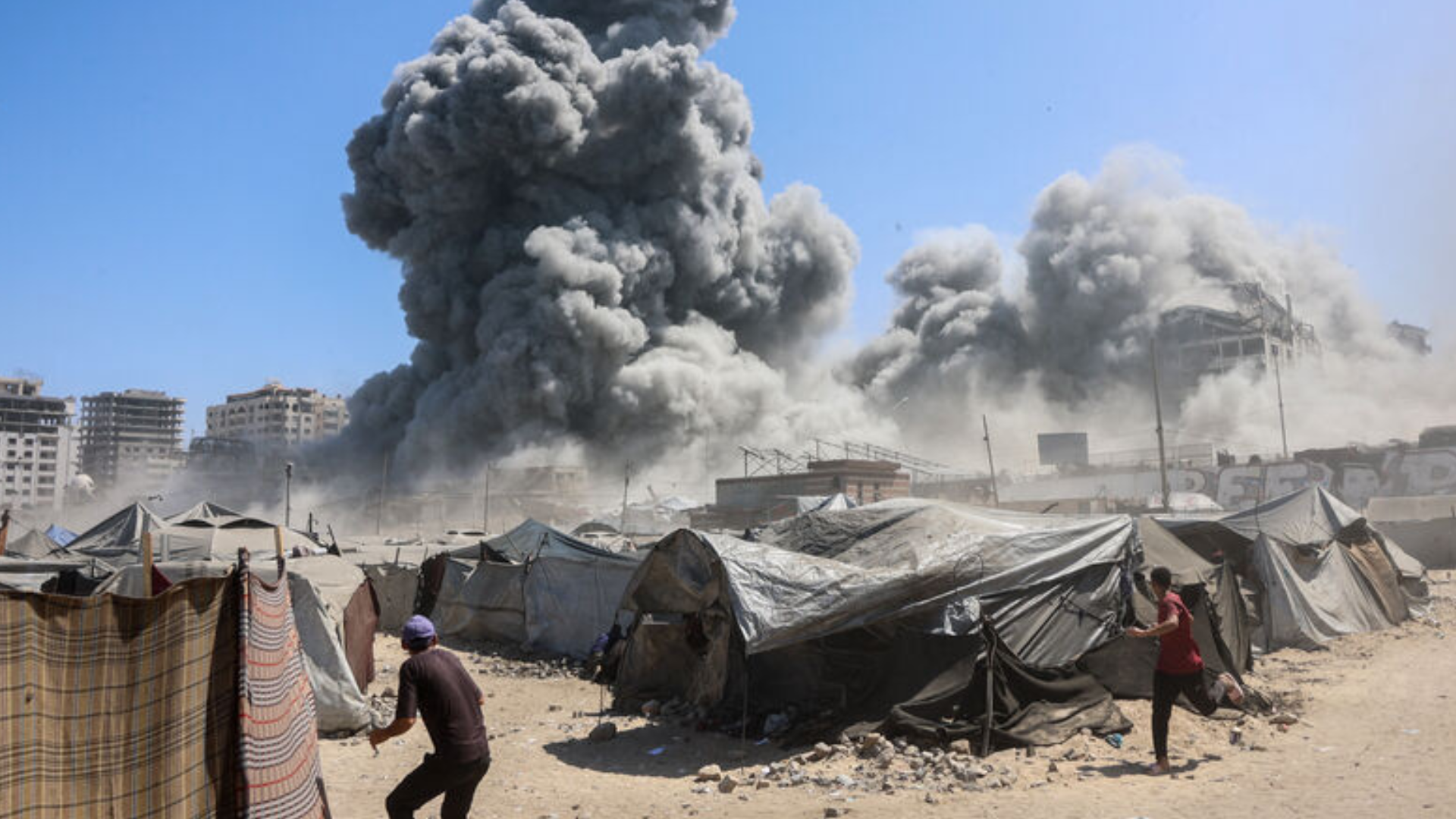Smoke billows in Gaza City after Israeli strikes on a tower on September 10 2025.
